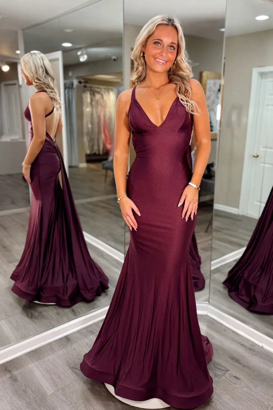 Loverlm plum mermaid evening dress with a V neckline, sleeveless fitted bodice and a flared floor-length skirt with a sweeping train.