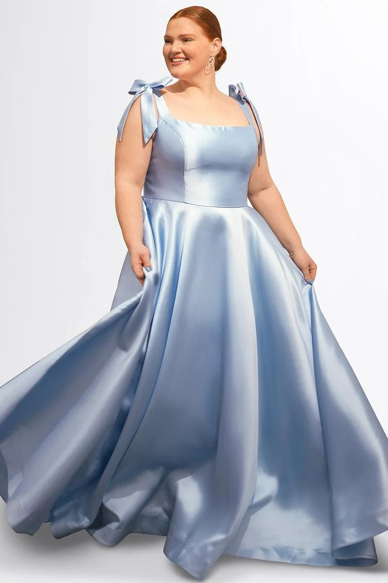Plus size light blue satin A-line prom dress with square neckline, bow shoulder straps, structured fitted bodice, and flowing floor-length skirt