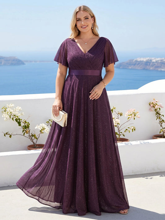 Front view of Loverlm plum purple plus size glitter tulle evening dress with V-neckline, flutter sleeves and satin waistband