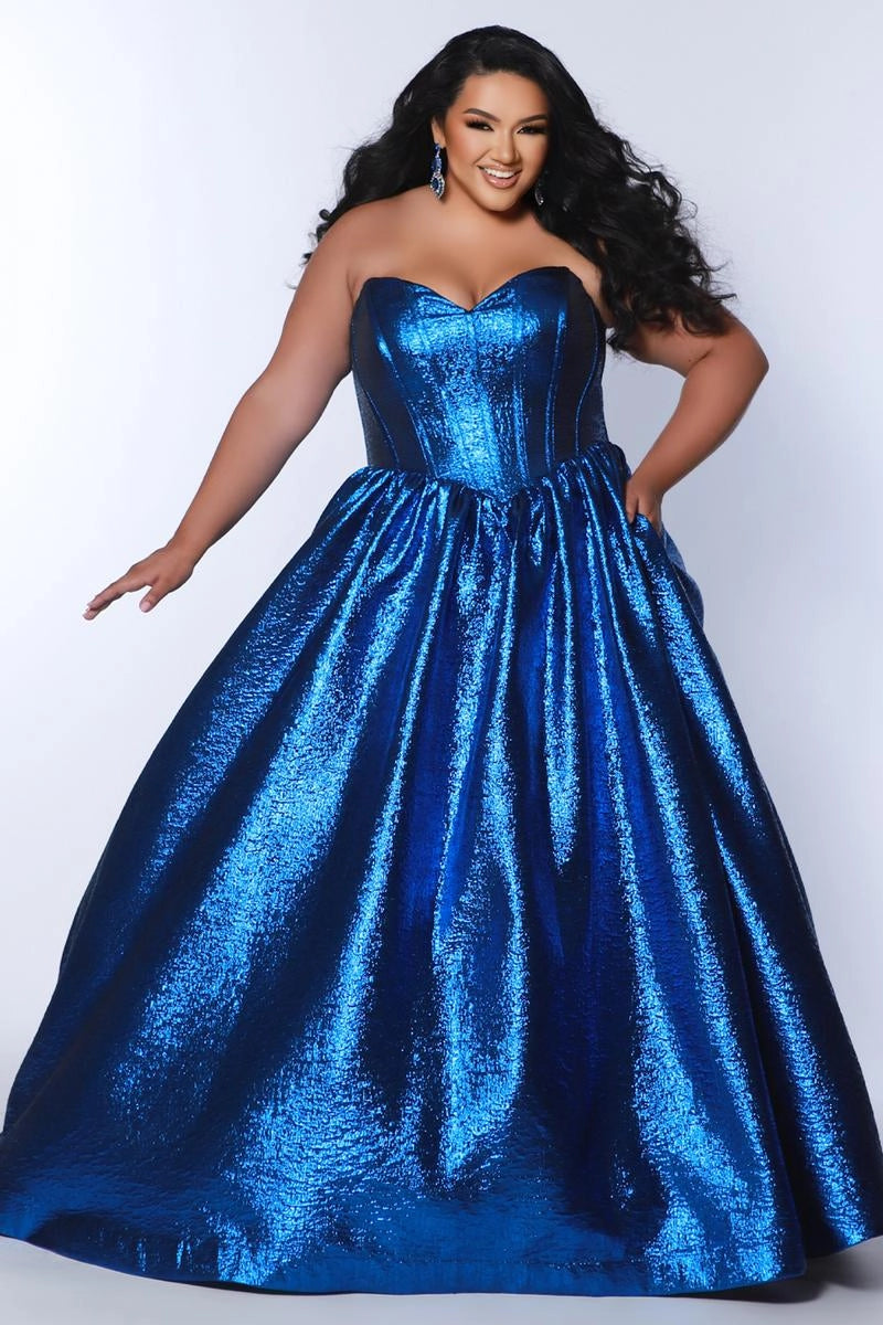 Plus size sapphire blue metallic ball gown prom dress with strapless sweetheart neckline, structured corset bodice, and voluminous floor-length skirt