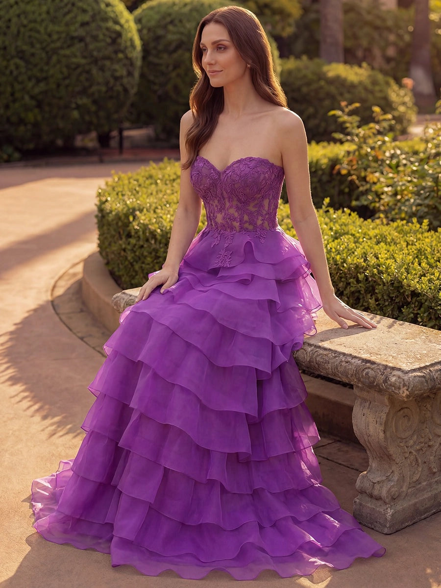 Front view of Loverlm purple lace ball gown prom dress with strapless sweetheart bodice and tiered organza ruffles
