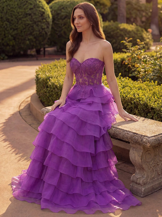 Front view of Loverlm purple lace ball gown prom dress with strapless sweetheart bodice and tiered organza ruffles
