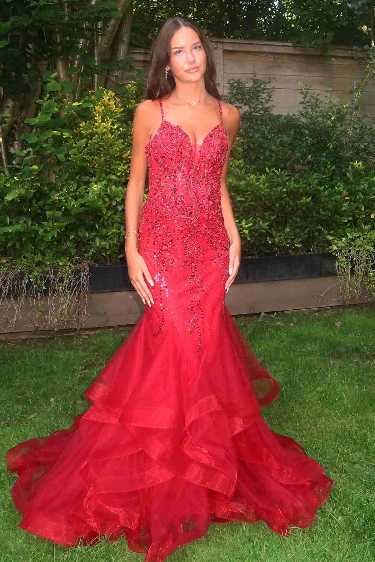 Loverlm red beaded mermaid prom dress with a plunging V-neck, spaghetti straps, fitted bodice, and cascading tulle ruffles.