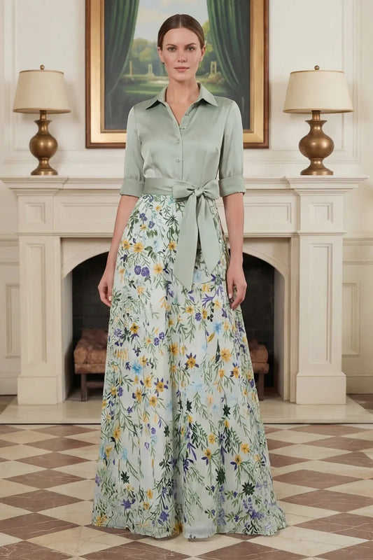 Loverlm sage green wedding guest dress with a satin collared bodice, cuffed sleeves, bow waist and floor-length floral A-line skirt, front view.