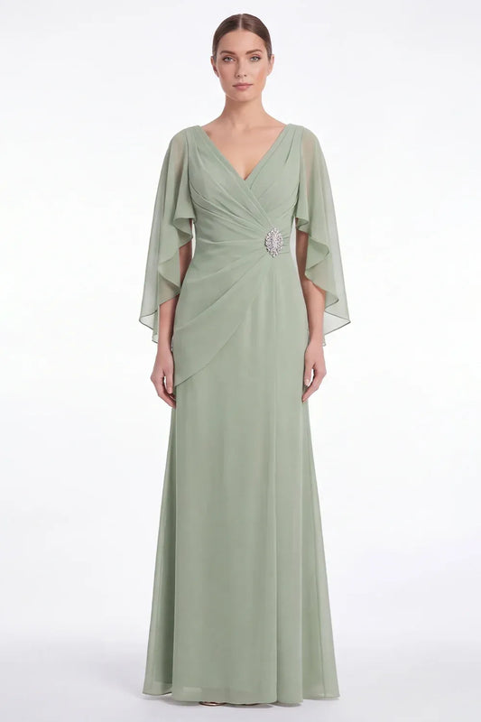 Loverlm sage green chiffon gown with a crossover V-neck, cascading cape sleeves, ruched waist and an oval jewel embellishment.