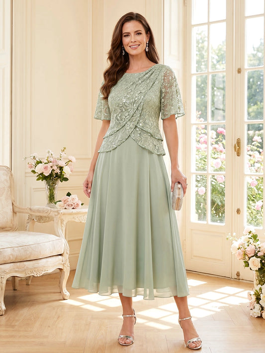 Front view of Loverlm sage green Mother of the Bride Dress featuring floral lace short sleeves, layered bodice and flowing tea-length A-line skirt.