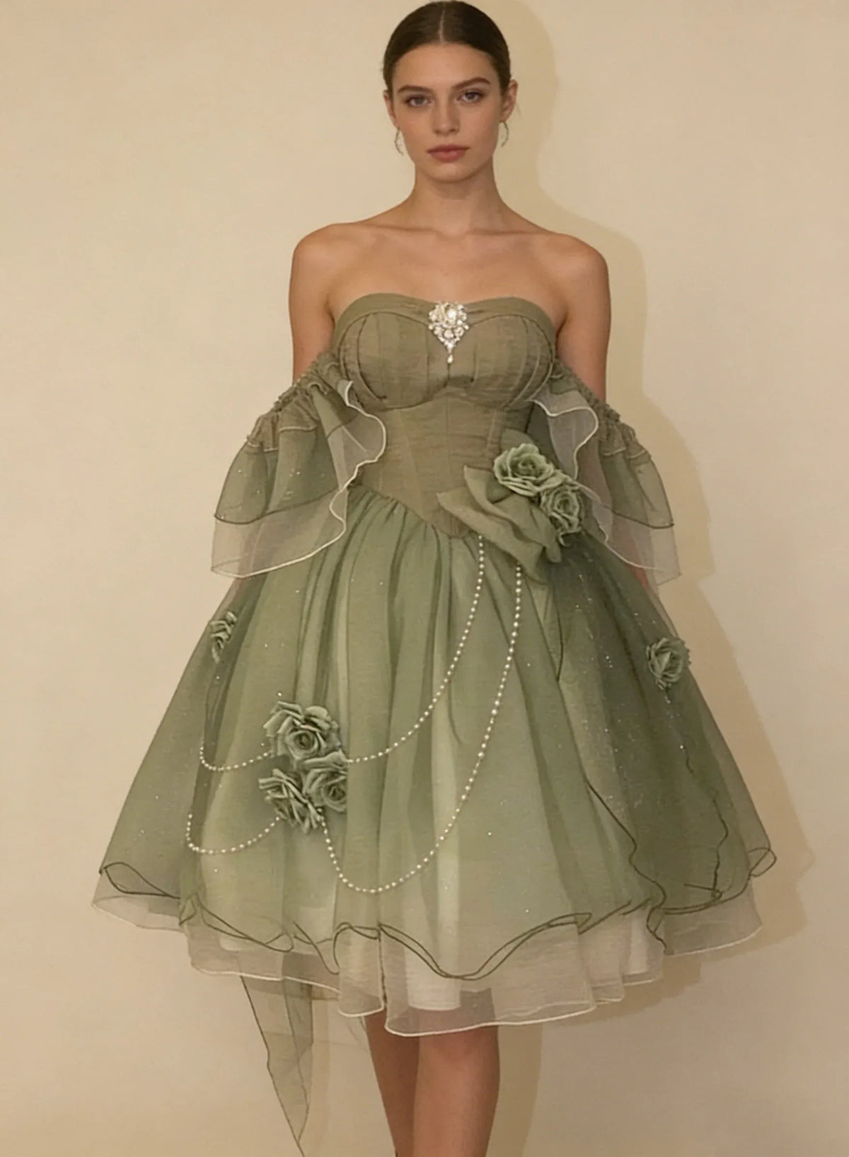Loverlm sage green short homecoming dress with sweetheart bodice sheer ruffle sleeves floral appliqués and pearl chain details front view