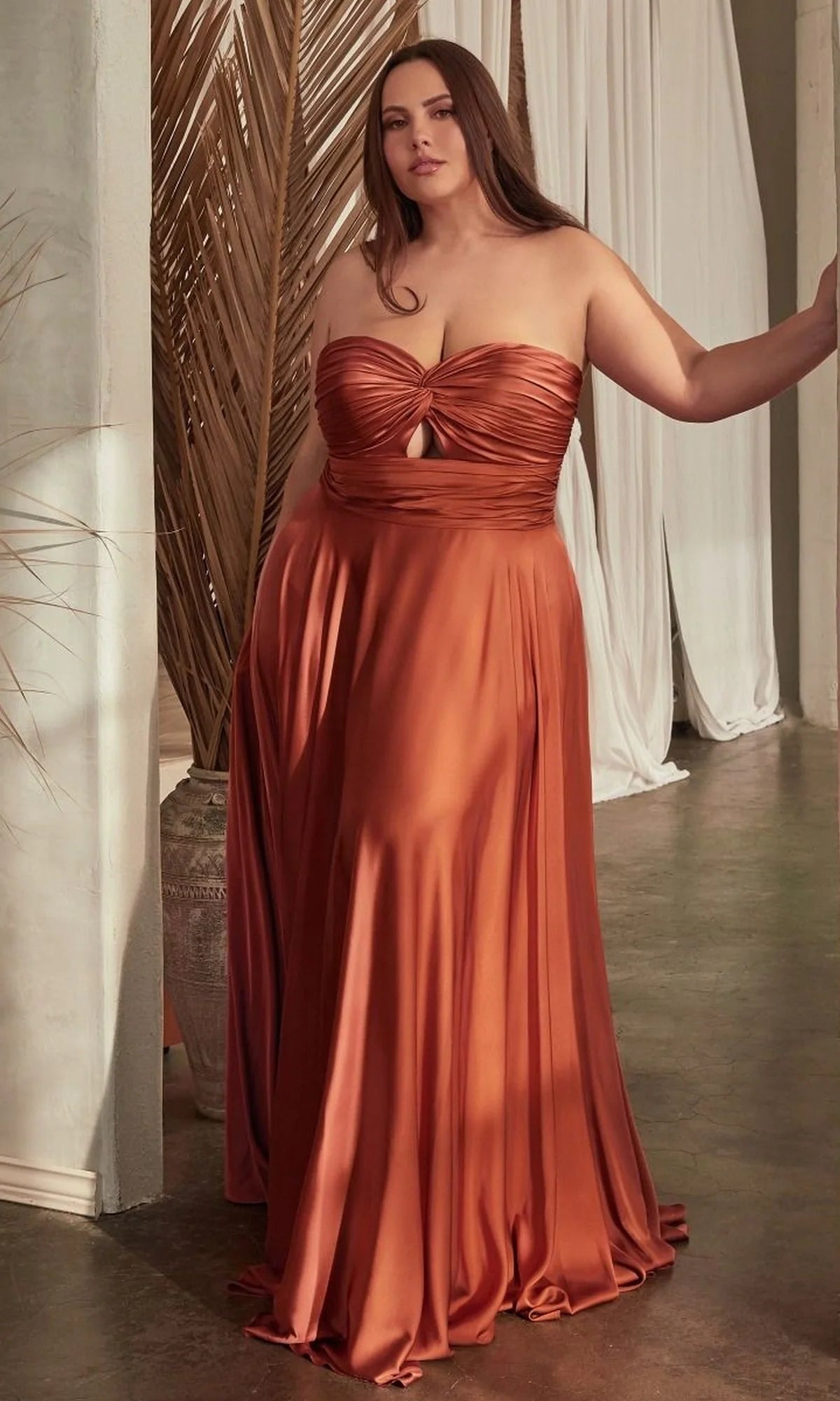 Sienna satin A-line evening dress with strapless twisted sweetheart neckline, small front keyhole cutout, ruched waistband and flowing floor-length skirt by Loverlm
