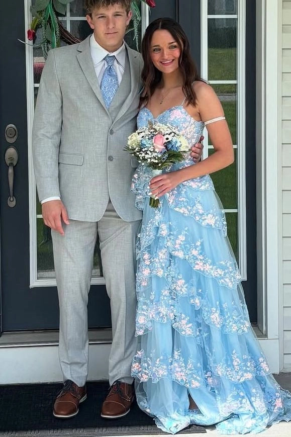 Front view of Loverlm sky blue prom dress with a sweetheart bodice, shimmering floral lace and a floor-length tiered tulle skirt.