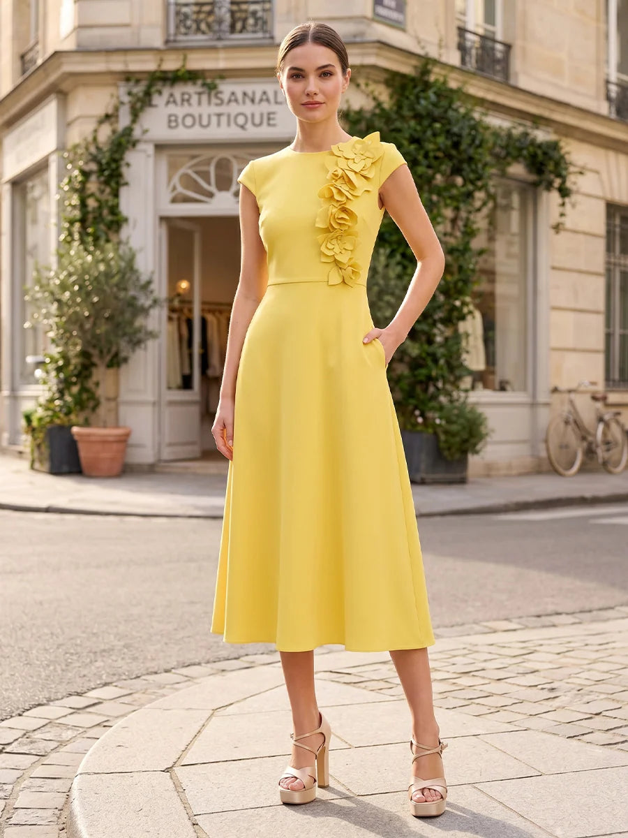 Sunshine yellow A-line wedding guest midi dress with round neckline, cap sleeves, cascading 3D floral appliques and side pockets by Loverlm