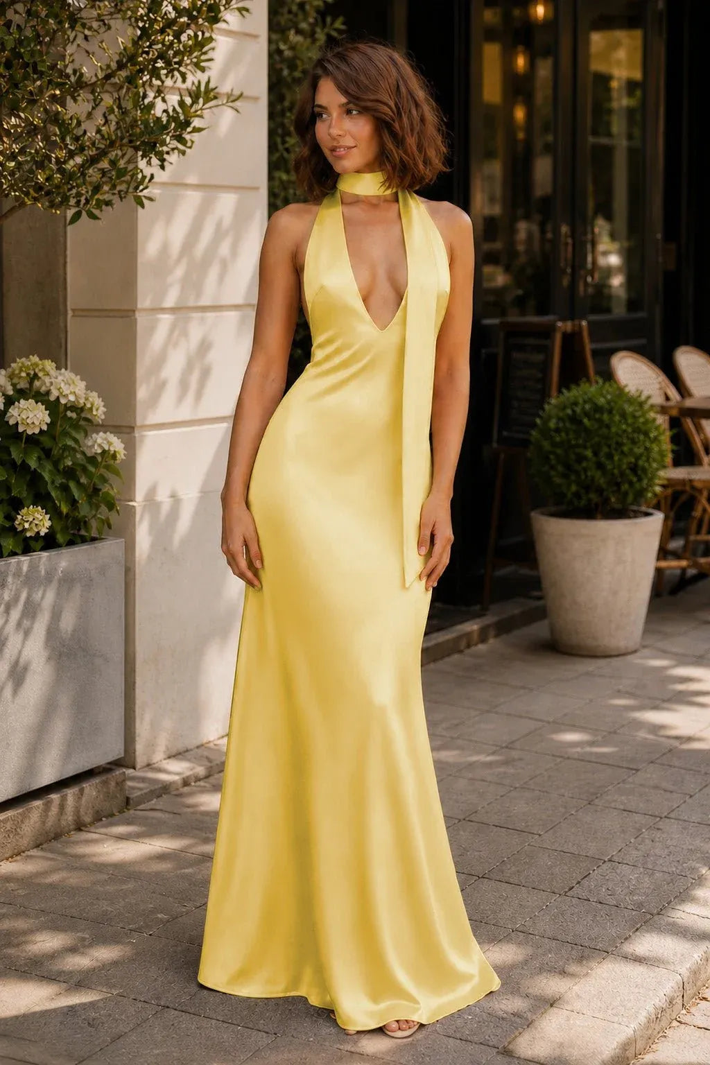 Loverlm yellow satin halter prom dress with plunging V-neckline and sleek floor length sheath silhouette front view